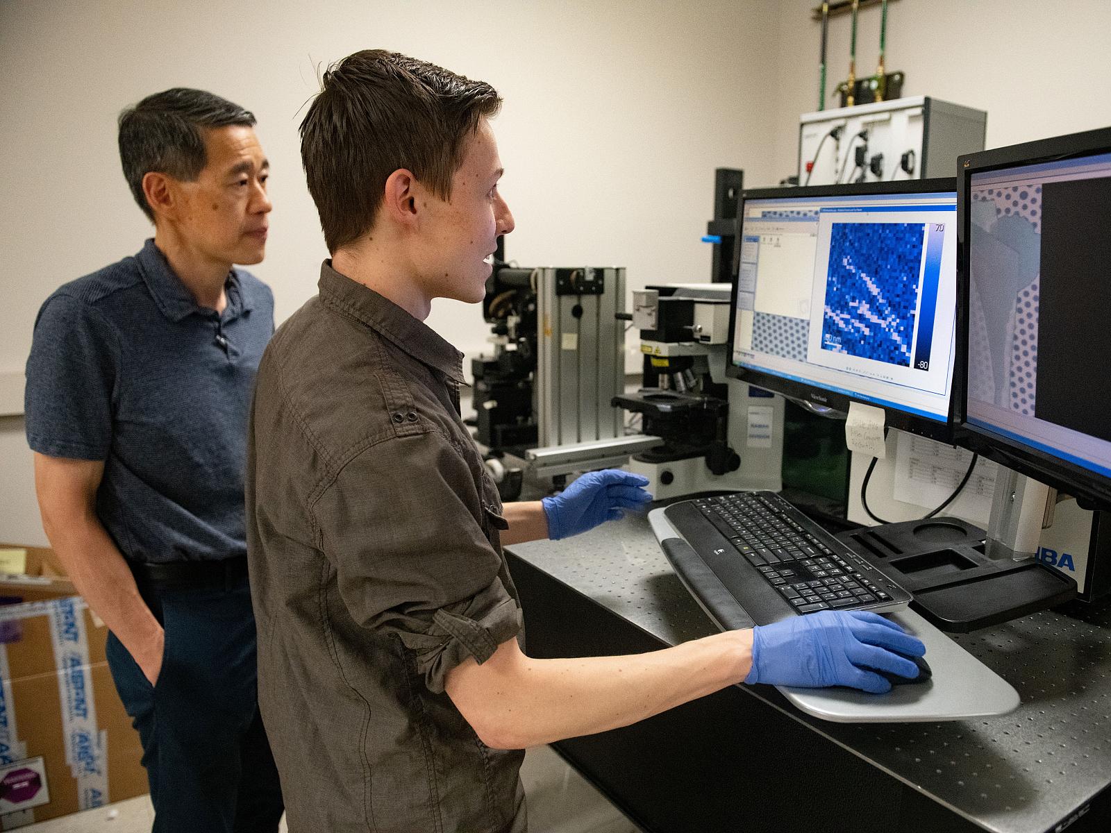 Professor Edward Yu and Ph. D. Student