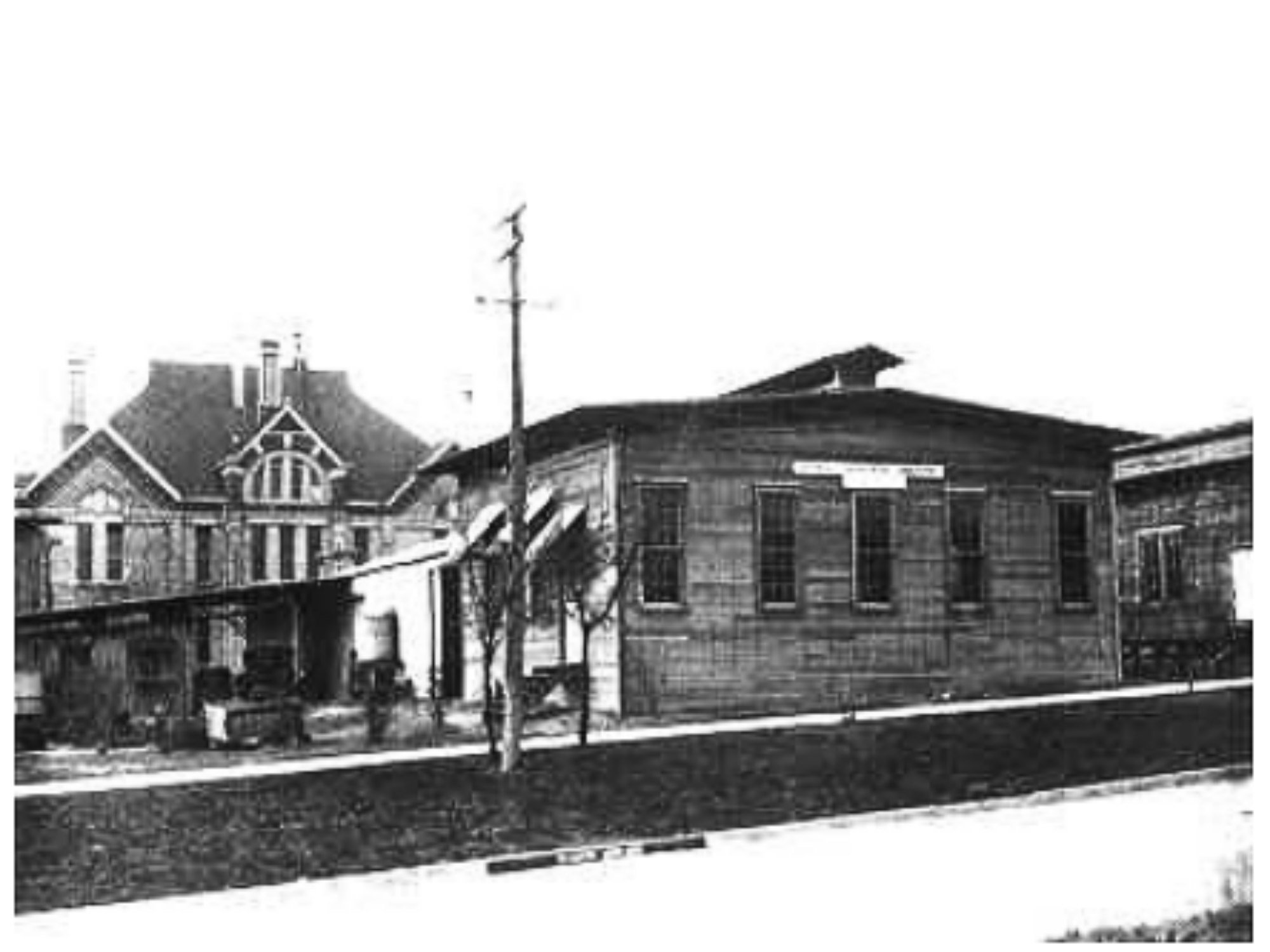 A UT Austin Tin Shack with Old Chem Lab in background