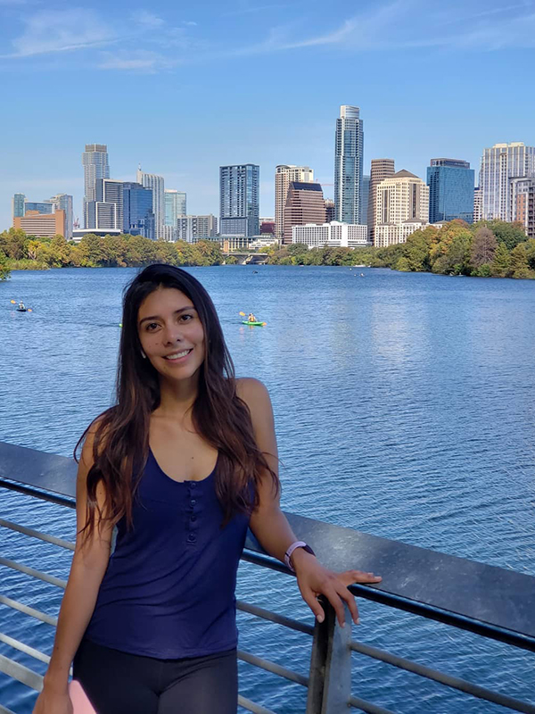 Angela Gordillo with the Austin skyline in the background