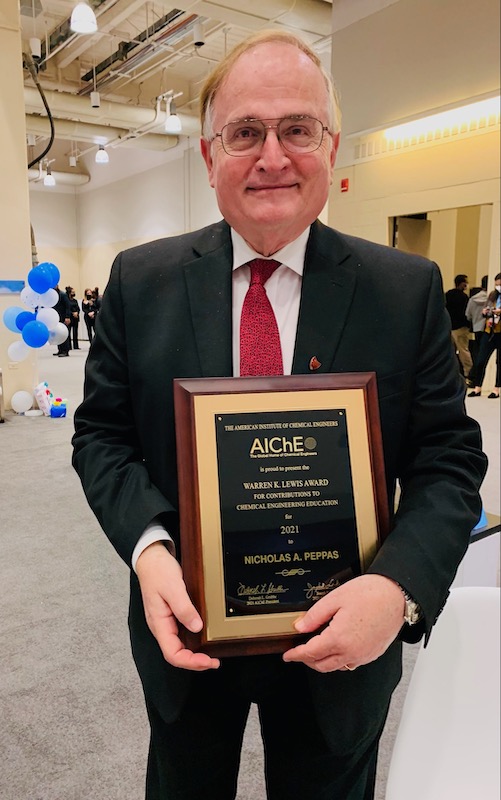 Nicholas Peppas holding AIChE 2021 Lewis Award