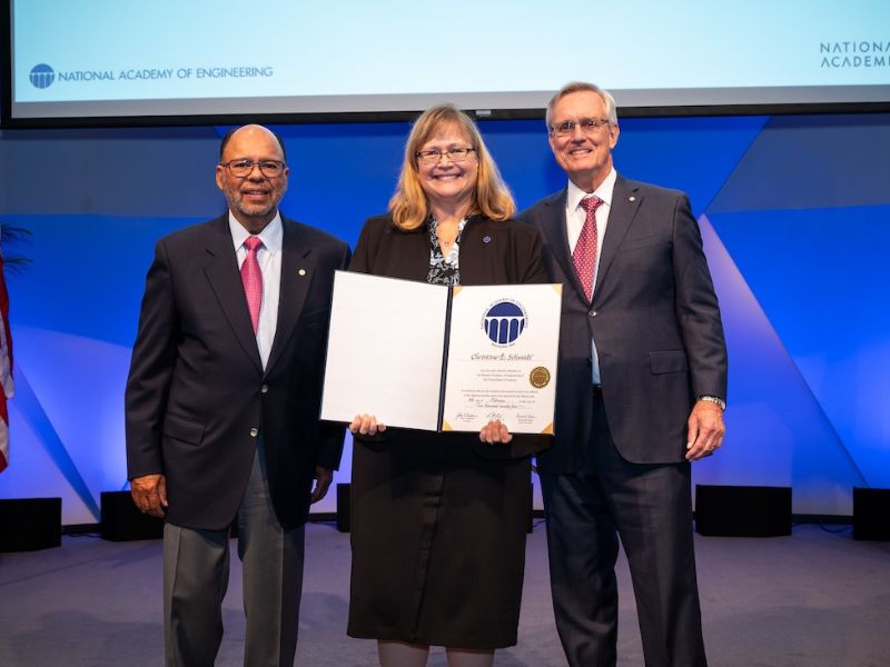 Texas Engineer Christine Schmidt holding award onstage