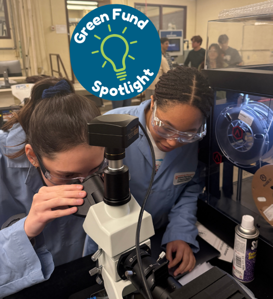Texas ChE students looking into microscope in lab