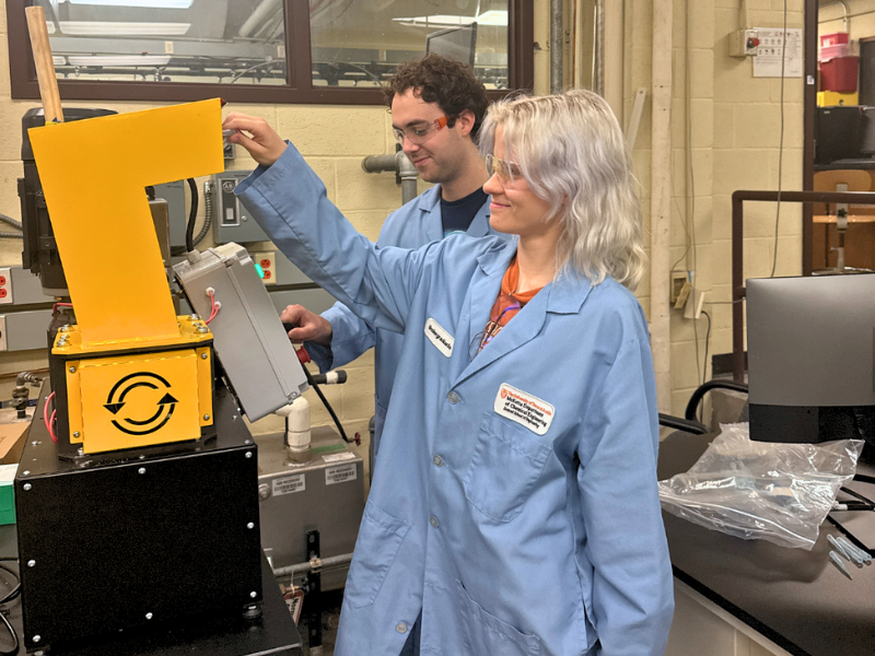 Texas ChE researchers working in lab