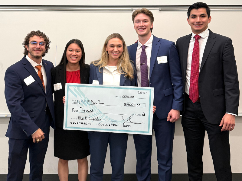 Texas ChE students Roger El-Bitar, Amanda Nguyen, Alexis Swain, Joshua Zellar, and Josafat Covarrubias smiling with large check