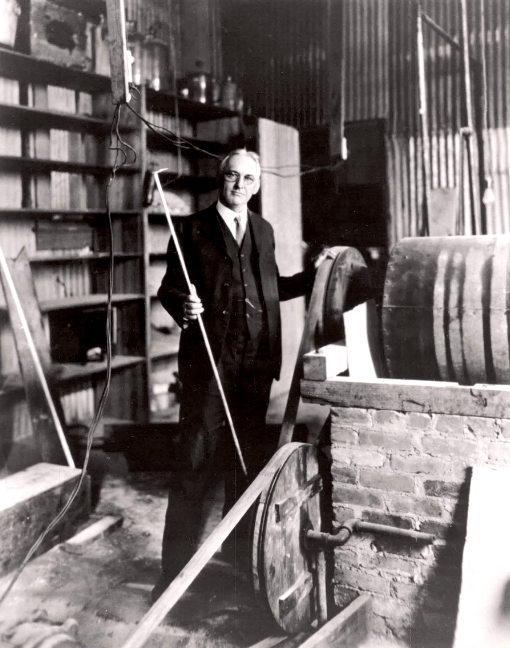 Black and white photo of E.P. Schoch standing in a laboratory